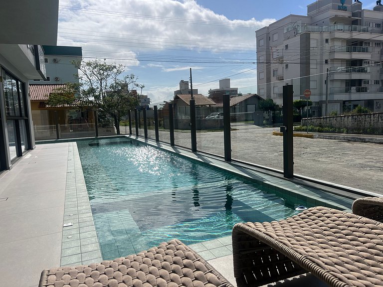 Piscina no condominio! Apto na praia de Palmas! OJ04I