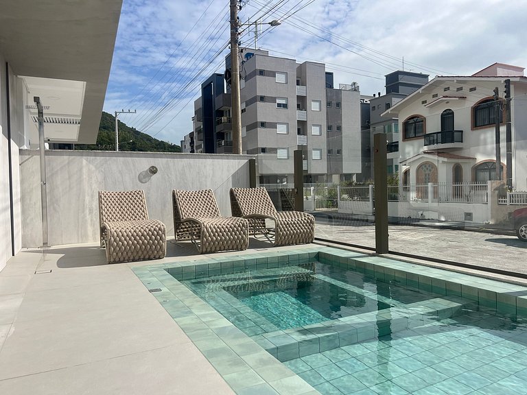 Piscina no condominio! Apto na praia de Palmas! OJ04I