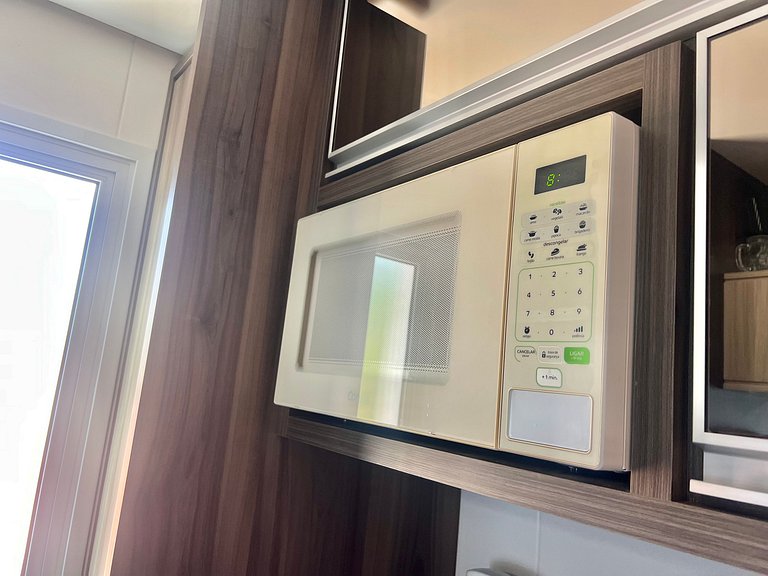 Aconchegante! Apto na Praia de Palmas. DR02J